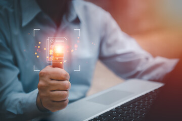 A man uses a smartphone to access an online document database. and automated processes to store files and documents in the organization effectively with enterprise business ERP technology