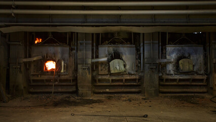 Fototapeta na wymiar Reverberatory gas furnace for remelting copper scrap and recycled copper.