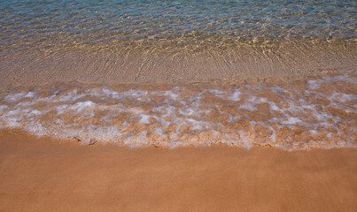 Tropical beach with sea sand on summer vacation.