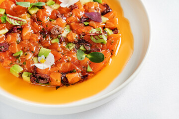 salmon tartar with avocado and herbs