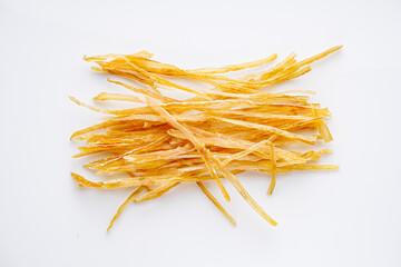 dried fish beer snack on a white acrylic background