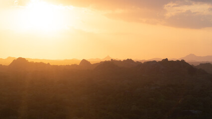 Obraz premium Colorful sunset over jungle and rainforest. Sri Lanka.