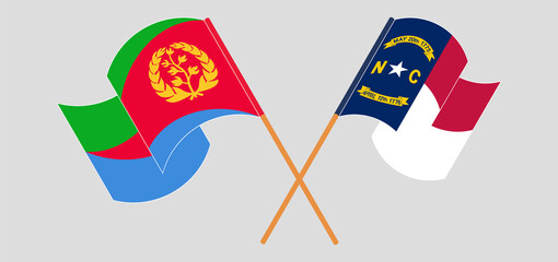 Crossed and waving flags of Eritrea and The State of North Carolina