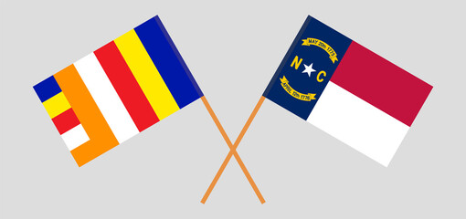 Crossed flags of Buddhism and The State of North Carolina. Official colors. Correct proportion