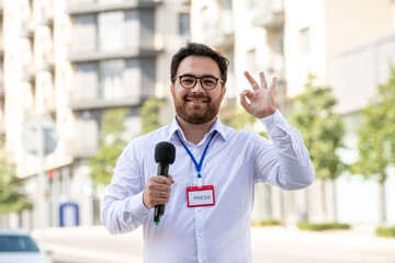 journalist professional brunette young journalist reporting news on television being confident