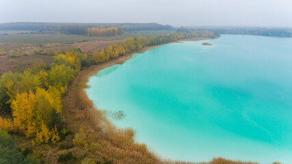 Fototapeta na wymiar Top view aerial drone photo of lake with turquoise water