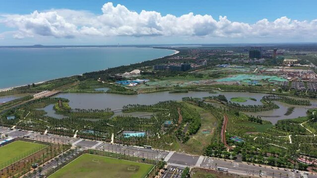 Aerial Video of Haikou City Jiangdong New District, an International Hub for Retail, Residential, Leisure, Workplace, and Transportation in Hainan Free Trade Zone, Hainan Province, China, Asia.