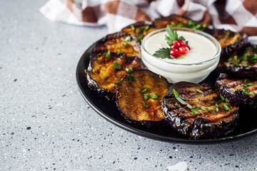 grilled eggplant on Georgian on a gray stone background