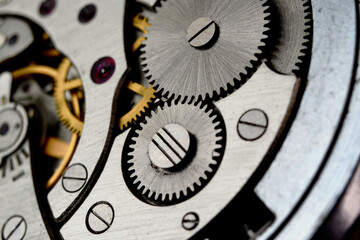 Clockwork. Macro shot of clock mechanism. Gears. Artistic blur