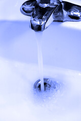 Sink Faucet Water Flowing Down Drain