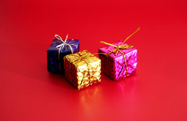 Christmas gift boxes on red background