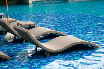 chair  relaxing in the pool