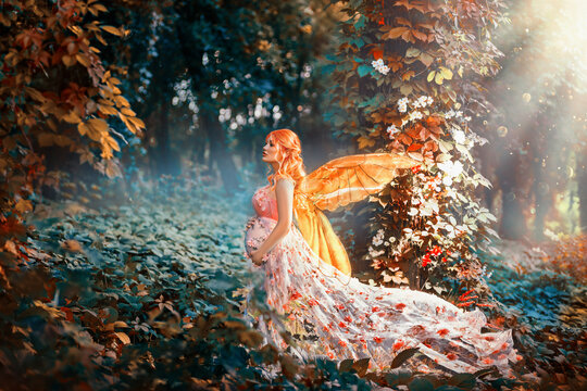 Creative photo session pregnancy happy woman fantasy fairy concept motherhood waiting for miracle. Happy adult sexy elf girl butterfly, pink dress silk fabric flies fluttering waving in wind motion