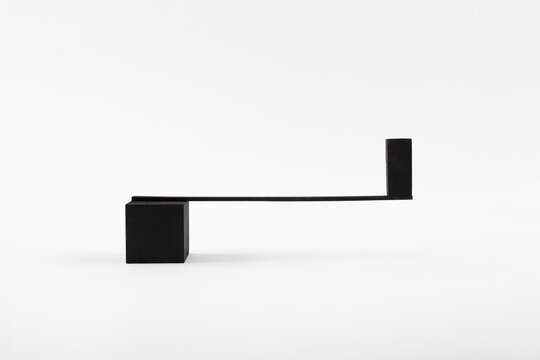 Geometric shapes balancing on one another