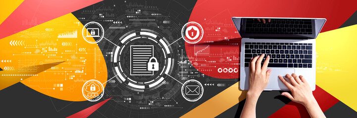 Data protection concept with person using a laptop