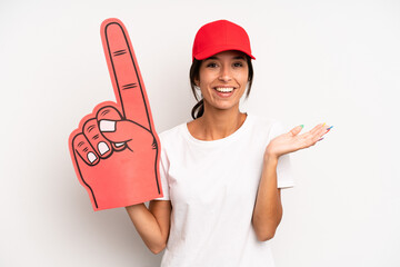 hispanic pretty woman feeling happy, surprised realizing a solution or idea. number one hand fan concept