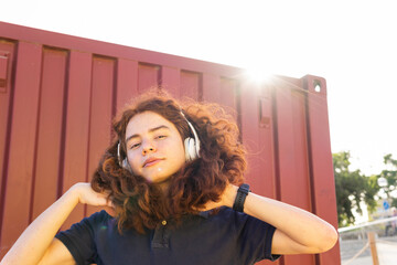 Portrait Of Woman Listening Music