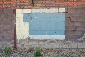Grungy wall with painted graffiti