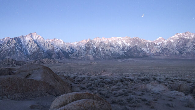 Mountain formations in wild nature in starry sky