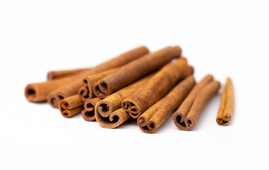 Cinnamon sticks on white background isolated. Indian spices close up. Medicinal herbs and spices.
