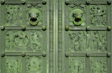 Bremen, Germany - July 13, 2022: Entrance of the Bremer Dom in Germany, Bremen. Green old entrance...