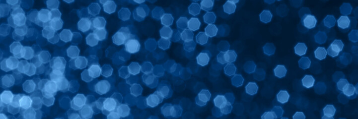Blue sparkling glitter bokeh background, christmas texture. Holiday lights. Abstract defocused...