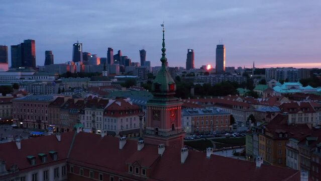 Warsaw, Poland - aerial of old town and city skyline at sunset