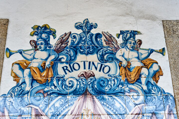 Fototapeta na wymiar azulejos panels on the wall of the Rio Tinto train station suburb of Porto, Portugal