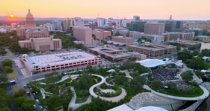 Bird's eye view of Sunset in Austin, Texas near Capital building and Waterloo Park. Bird's eye view from the top looking up.