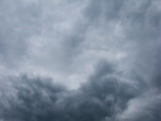 Fototapeta na wymiar Photo of a gray cloudy sky with clouds