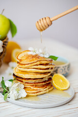 Pancakes with honey, lemon and apple