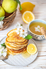 Pancakes with honey, lemon and apple