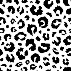 Leopard seamless pattern. Repeated animal dot. Black spot skin on white background. Repeating irregular dots leopards, jaguars, cheetahs, panthers. Design prints. Repeat printing. vector illustration  © Omeris