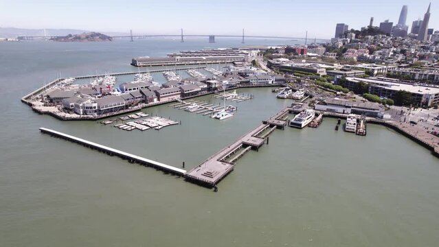 Aerial Shot of Famous Pier with Bay Bridge in Background - San Francisco, CA