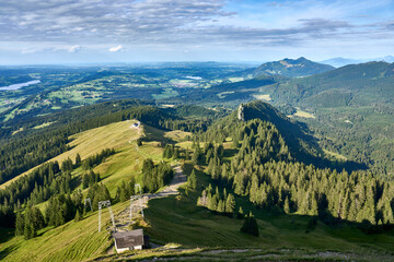 Fototapeta na wymiar panoramic landscape view from Mount Gruenten over the summits of the Allgaeu alps and Iller valley near Immenstadt, Bavaria, Germany