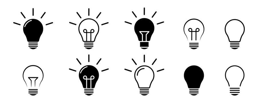 Set of light bulb vector icons. Black icons lamps or bulb and rays. Lightbulb. Symbol for idea and science. 
