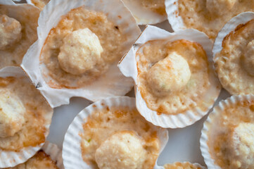 Plate with delicacy roasted scallops with cheese