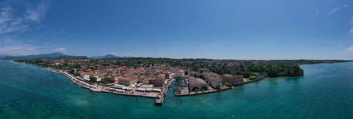 Aerial view of Lazise city, Verona. The historical part of the city of Lazise, coastline. Aerial panorama of Lazise town on Lake Garda Italy.
