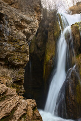 Naklejka na ściany i meble Waterfall in the forest