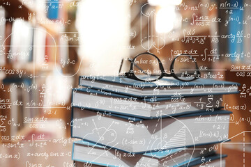 Science and education concept. Illustration of basic physics and mathematics formulas and stack of books with glasses in library