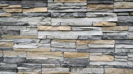 Slate cladding building wall, wide background