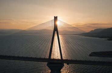 Obraz premium Aerial view of cable bridge of Rio - Antirio during sunrise, 