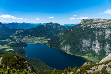 Stunning aerial panorama view of Altaussee lake from Trisselwand with the peak Loser on a sunny summer day, Styria, Austria