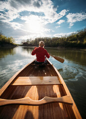 Woman paddling canoe on the lake