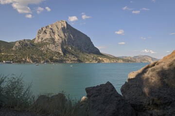 Beautiful panoramic top view of the beach and mountain range in the Green Bay of the village of Novyi Svet in the southeast of Crimea, Sudak, Black Sea, Russia.