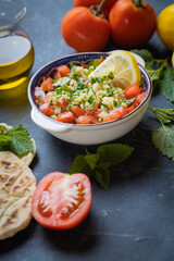 Lebanese tabbouleh salad with bulgur, parsley, tomato and cucmber