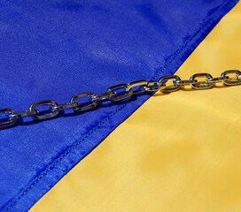 Ukrainian flag. The chain on the flag is Russia's attempt to enslave Ukraine.