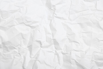 Sheet of white crumpled paper as background, closeup