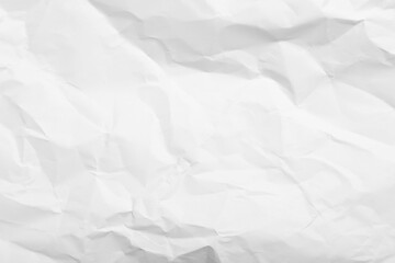 Sheet of white crumpled paper as background, closeup