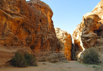 view from the inside of a canyon among the red rocks of the mountains of the middle eastern desert
